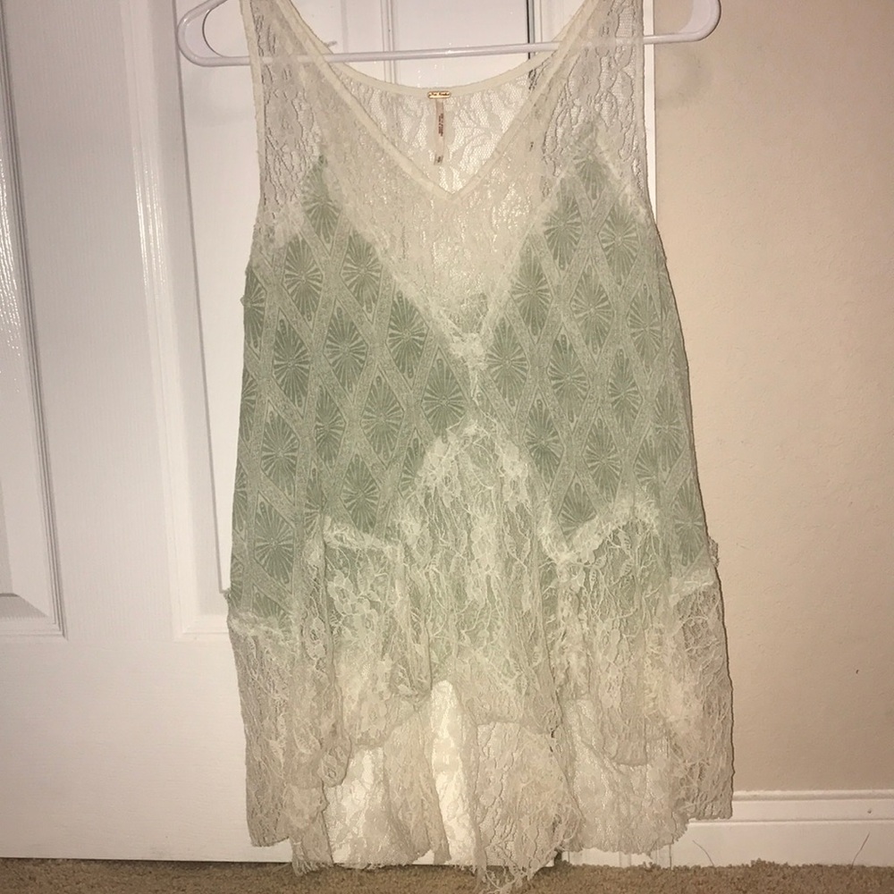 Free people flowy tank top with lace details
